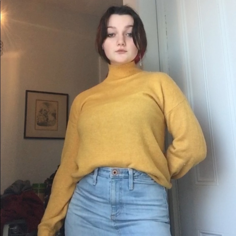 Yellow turtleneck sweater